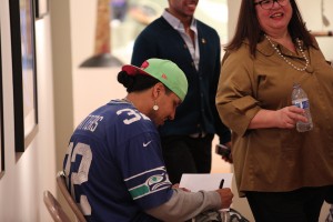 Gyasi Ross signs his new book